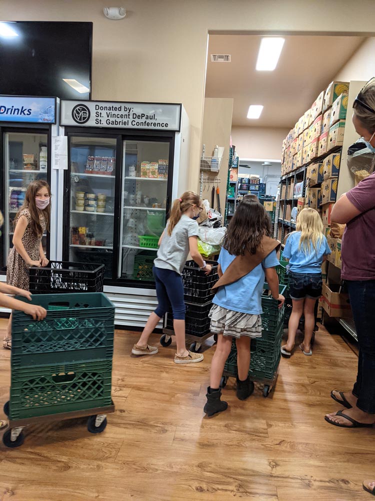 girl scouts visit the foothills food bank